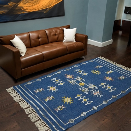 Blue aztec style kilim rug