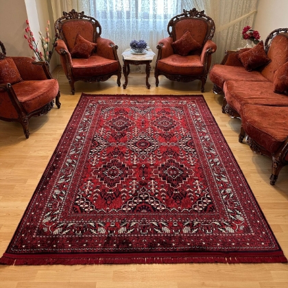 Large red afghan style rug