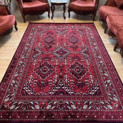 Large red afghan style rug