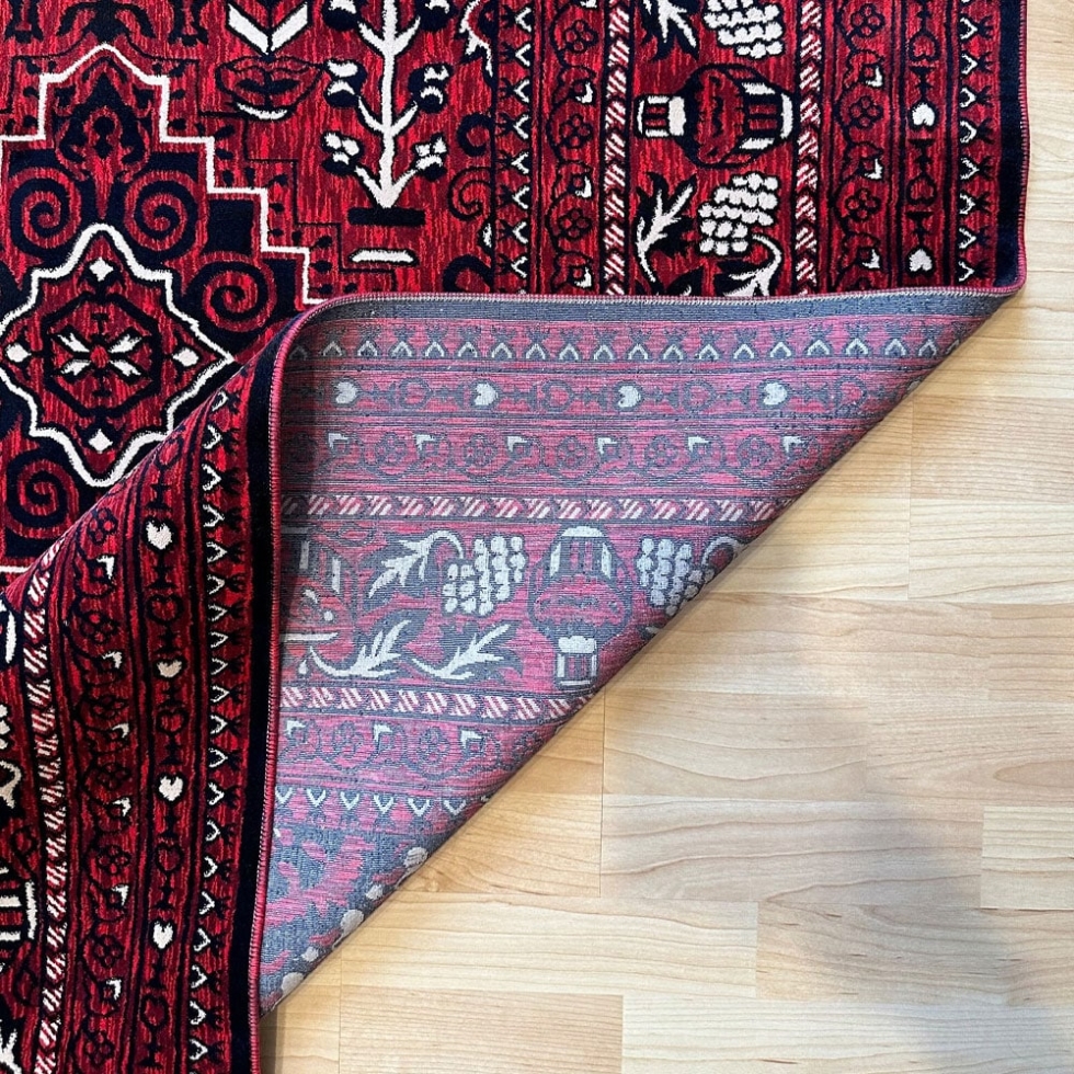 Large red afghan style rug