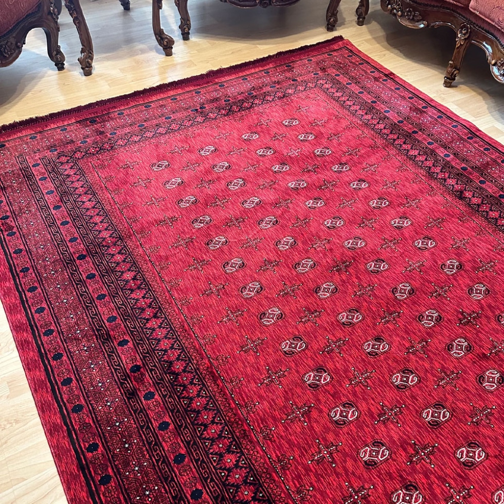 Red afghan style printed rug