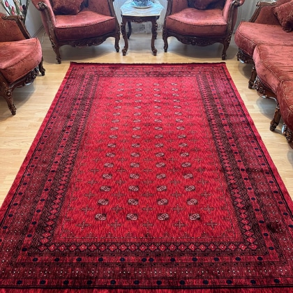 Red afghan style printed rug