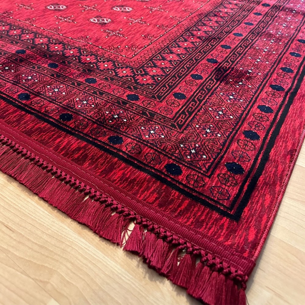 Red afghan style printed rug