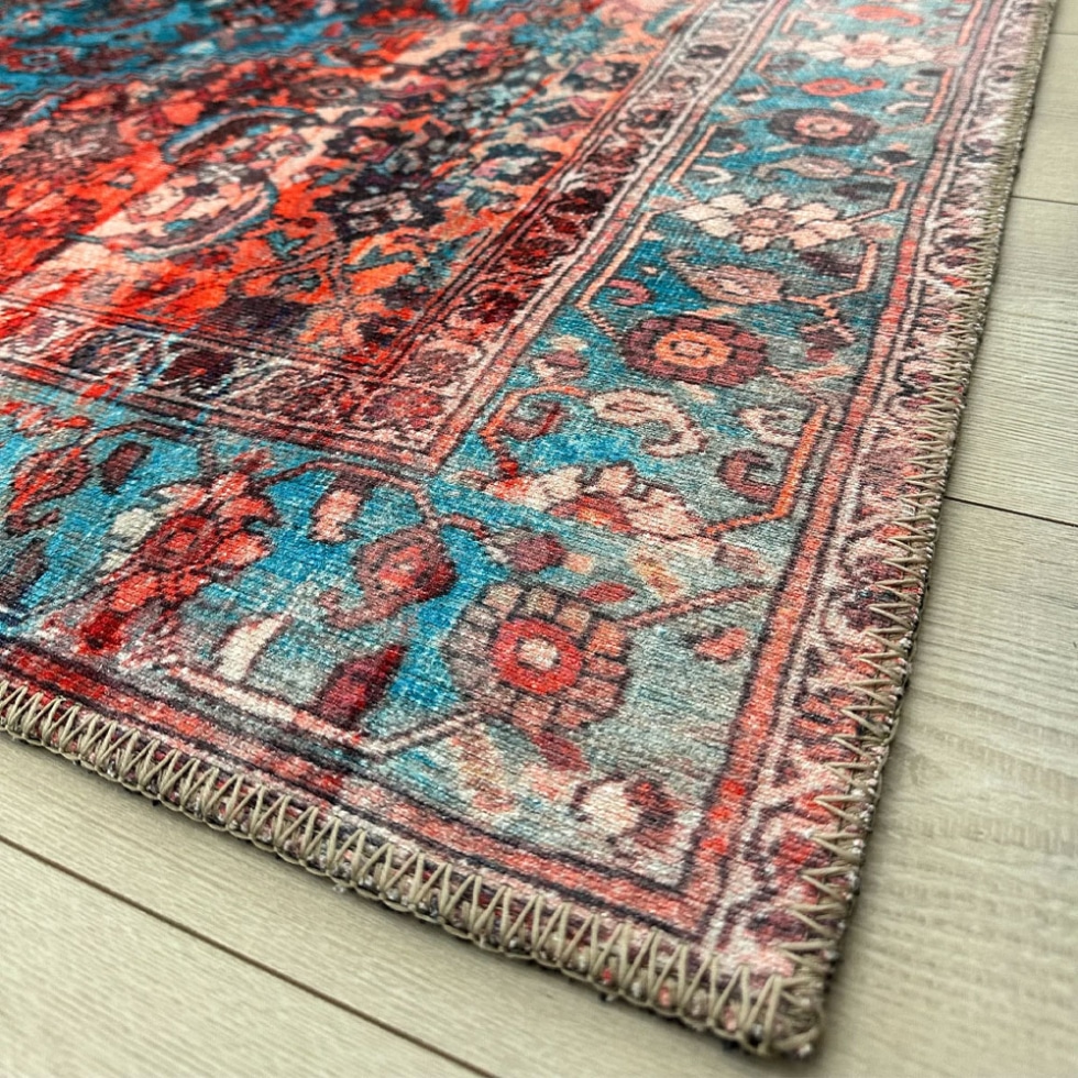 Red and blue vintage style printed rug