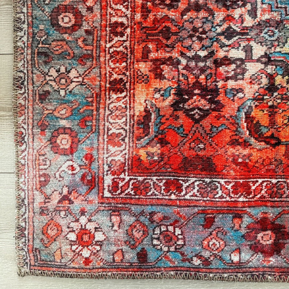 Red and blue vintage style printed rug