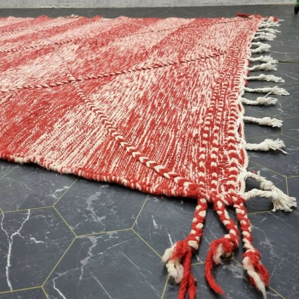 Red and white berber kilim rug