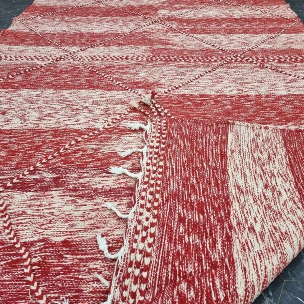 Red and white berber kilim rug